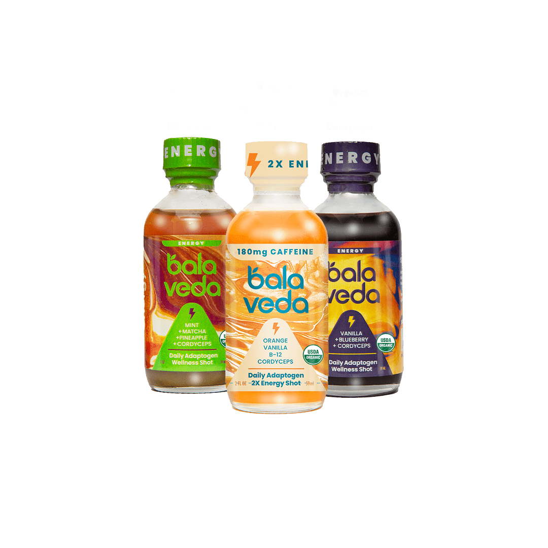 Three glass bottles of Bala Veda energy drinks shots